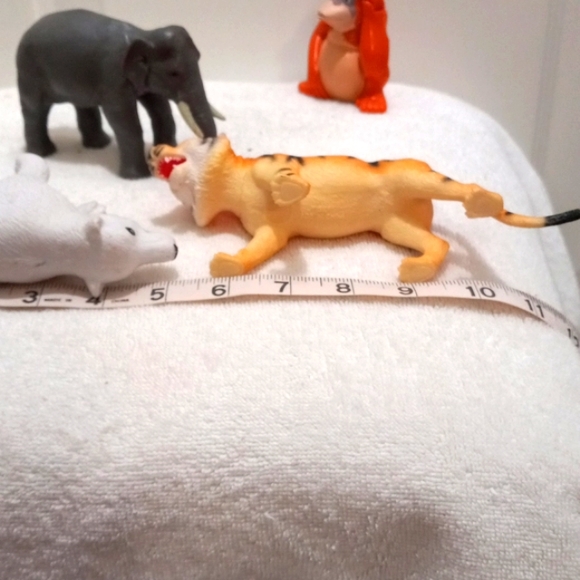 4 Jungle Animals Approx 5" long, hard plastic. - Picture 3 of 3